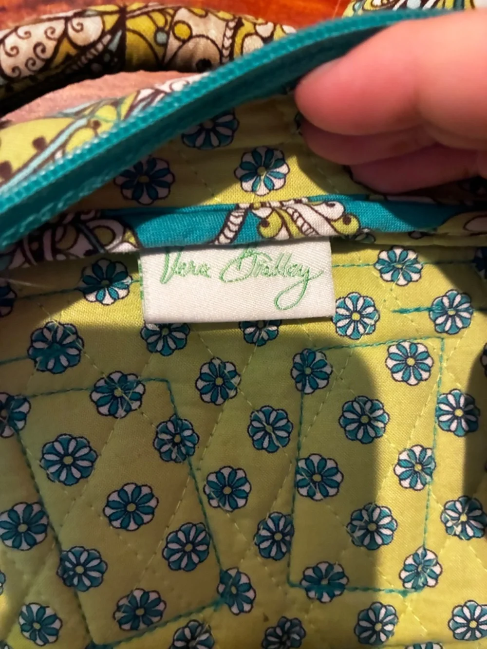 Peacock green Vera Bradley backpack with little necessity pouch